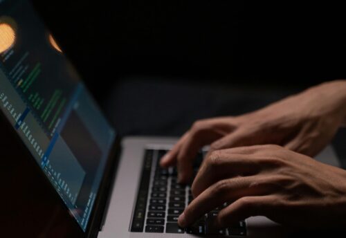 person-using-silver-and-black-laptop-computer