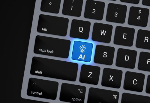 a-close-up-of-a-keyboard-with-a-blue-button